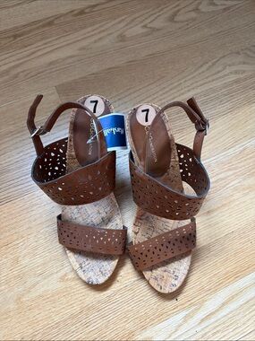 BCBGeneration Brown Laser-Cut Cork Wedge Sandals